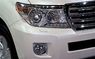 Оптика (фары) светодиодная Toyota Land Cruiser 200 белые с ангельскими глазками + линза