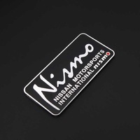 Шильд - эмблема алюминиевая Nissan "Nismo" черная