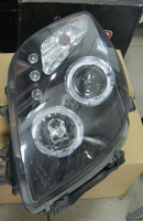 Фары (оптика) линза Toyota Vitz / Yaris 2005-2008 (черные) TYC