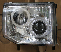 Оптика (фары) Mitsubishi Pajero с ангельскими глазками + линза (1991-1998) белые