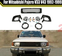Тюнинг комплект фары + решетка Mitsubishi Pajero V43 1992-1999