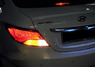 Стопы (фары) «BMW Design» для Hyundai Solaris 2010+ (дымчатые, красные)