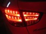 Стопы (фары) «BMW Design» для Hyundai Tucson Ix35 (прозрачные, красные)
